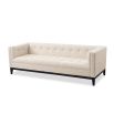 A luxury sofa by Liang & Eimil with a sophisticated design and beautiful beige upholstery