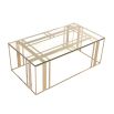 Modern coffee table with polished brass finish and tempered glass surface