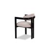 Beige velvet dining chair with three-legged structure in black