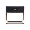 Black bedside table with brass handle and brass legs