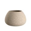 Round terracotta planter finished in beige