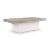 A contemporary coffee table by Caracole with a modern design, clean lines and a travertine stone top