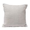 Grid textured cushion with grey and white tones