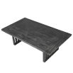 Black rectangular coffee table with slatted legs