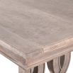 Wooden rectangular dining table with carved circular detail 