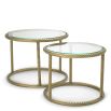 Side table with brass finish frame and sleek glass top