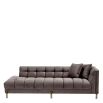 Grey velvet corner sofa with brass finish accents