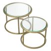 Side table with brass finish frame and sleek glass top