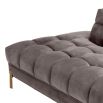 Grey velvet corner sofa with brass finish accents