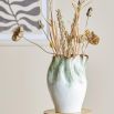 Elevate your decor with the Nisha Vase—a stunning blend of elegance and artistry, perfect for showcasing your favorite blooms or as a statement piece.