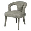 Upholstered dining chair in cut out design in green/grey finish