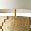 Geometric cut-out, travertine-style lamp with a cream shade