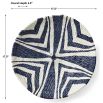 Ceramic striped navy and white bowl moulded from authentic wicker basket