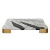 White and black marble slab tray elevated on brass feet