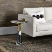 Glamorous black and white marble accent table with brass detailing