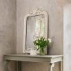 Curvaceous, traditional-style cream console table