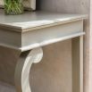 Curvaceous, traditional-style cream console table