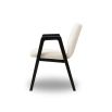 Modern dining chair with black wood arms and cream upholstery