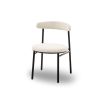 White and black minimalist dining chairs with boucle upholstered back rest and round seat