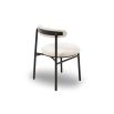 White and black minimalist dining chairs with boucle upholstered back rest and round seat