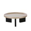 Beautifully circular beige coffee table with three black legs