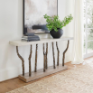 Wooden plinth console table with branch-like bronze framework and concrete style top