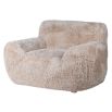 Cosy, wooly wide silhouette armchair in neutral colour