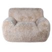 Cosy, wooly wide silhouette armchair in neutral colour