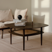 Dark brown square coffee table with a rattan shelf beneath