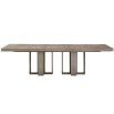 Rectangular dining table with rich wood grain and metal accents