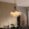 Divine ceiling lamp with bronze frame and balloon style, cream glass light fixtures.