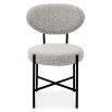 Mid-Century Modern style chair featuring a soft-touch Bouclé grey upholster