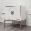 A white lacquer side table with large door and acrylic handle 