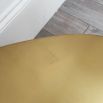 teardrop shaped brass side table