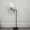 floor lamp with black metal frame and white shade