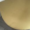 teardrop shaped brass side table