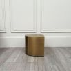 teardrop shaped brass side table