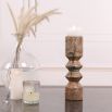 Coffee-coloured marble candle holder with cut-out design