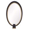 Black oval wooden mirror with brass detailing on inner circle