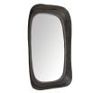 The Fitzhugh Mirror features a forged iron frame with petal-like curves, a bronze finish, and versatile vertical or horizontal display.