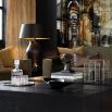 Large black metal table lamp with organic textured finish, shade not included